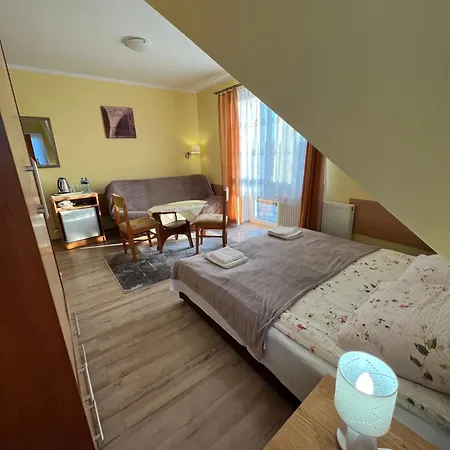 Δωμάτια σε οικογενειακή κατοικία Goscinne 